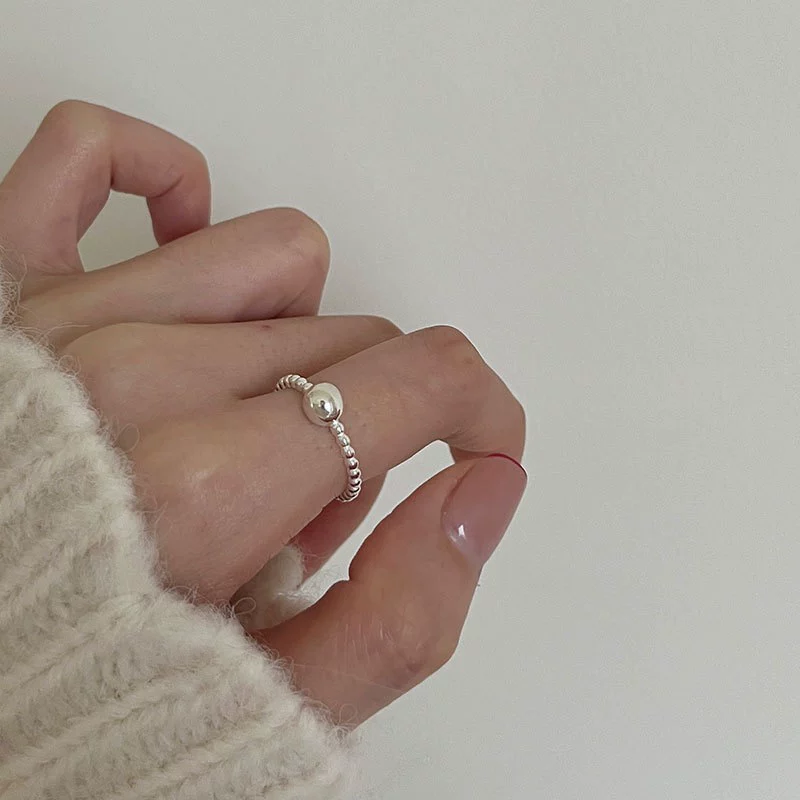 Ring, silver 925 sample, simple and elegant design, on index finger