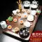 Cha Xuân hoàn toàn tự động khay trà hộ gia đình ấm đun nước tích hợp bàn trà gỗ nguyên khối kung fu trà phòng khách trà biển bộ pha trà điện Bàn trà điện