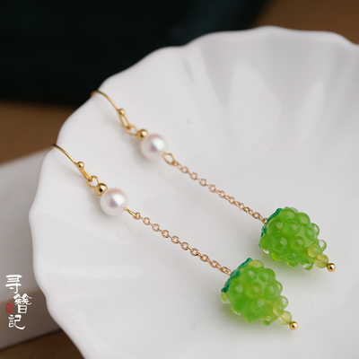 taobao agent Finding a puppet with red and green earrings earrings
