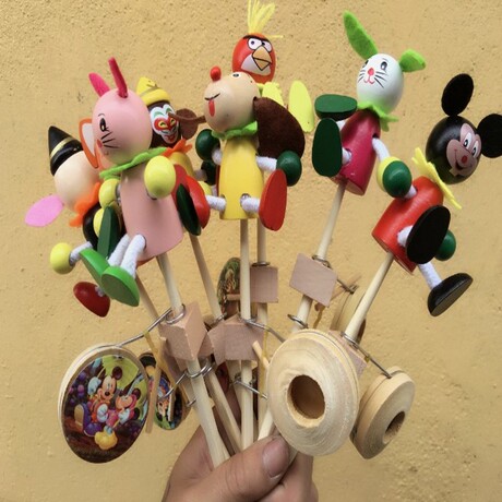 地摊货源热卖 跑江湖玩具 木偶鼓手摇鼓 木偶摇摇鼓 卡通木人摇鼓