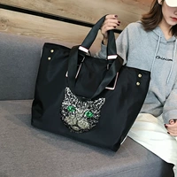 Кошка голова черная