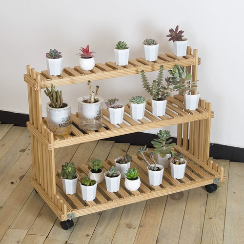 Полихид стойка поступила в сплошной древесной платформе балконы балконы растения растения растения с колесами для перемещения могут быть перемещены