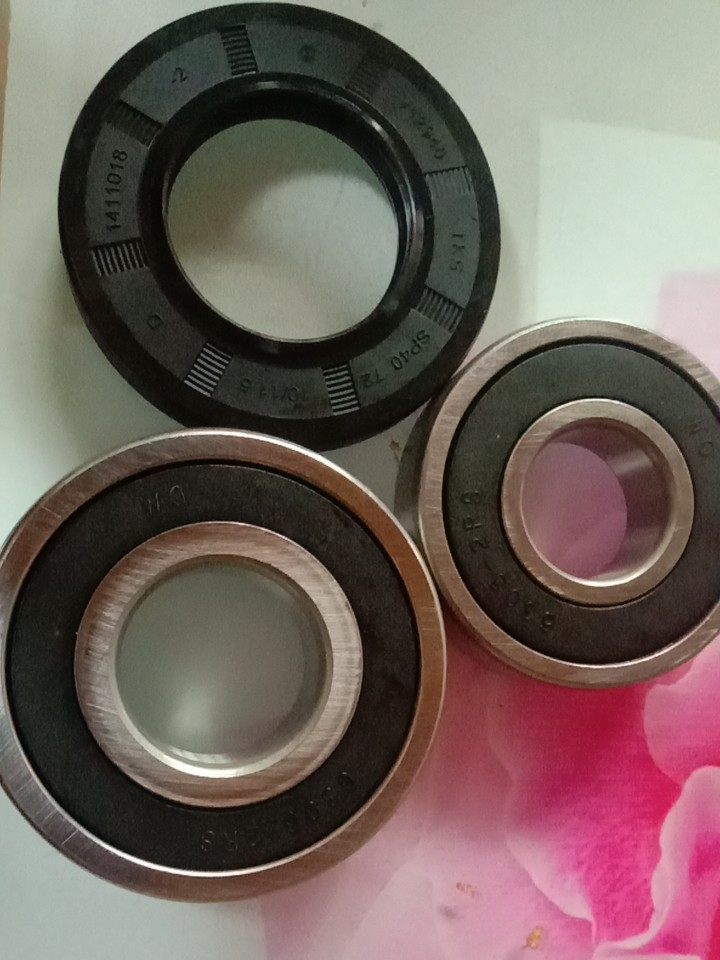 海尔滚筒洗衣机轴承油封nsk升级滚珠水封密封胶圈三脚架全新配件