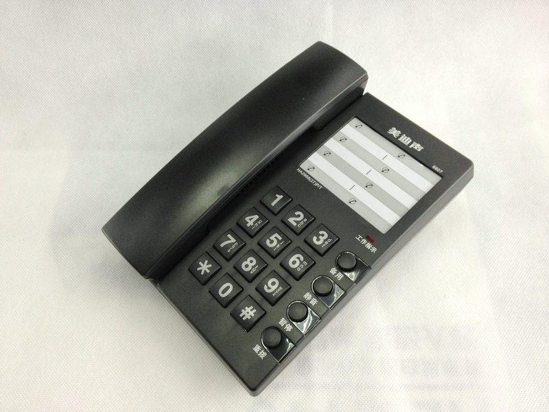 

Проводной и DECT-телефон US 6607