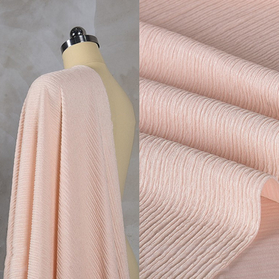 taobao agent Light pink thousands of leafy belly cloth fold cloth texture fabric elasticity, smooth spring and summer shirt pants fabric