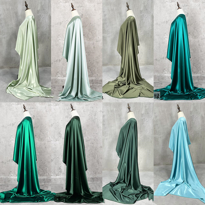 taobao agent Green series imported real three acetic acid satin fabrics pearl light silk skids real silk cheongsam dress fabric