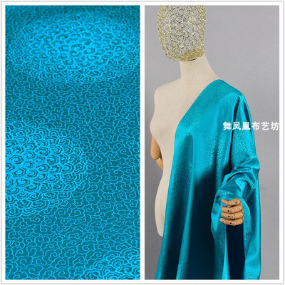 taobao agent Peacock Lake blue brocade satin Xiangyun flower satin fabric Tang clothing Mongolian robe, hidden robe cushion children's clothing fabric