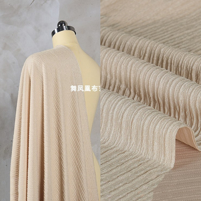 taobao agent Rice apricot, thousands of leafy belly cloth folds wrinkle texture fabric elasticity, smooth spring and summer shirt pants cloth material