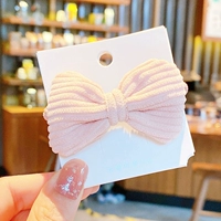 Розовая заколка для волос с бантиком