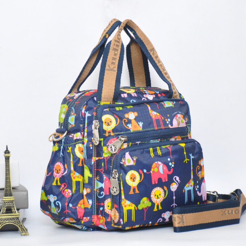 Kudi Long hand-held shoulder bag women's cloth bag multi-pocket mommy bag large capacity multi-function bag tide