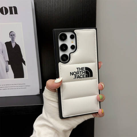The North Face Phone Cases Covers Trendy Fashionable Puffy Puffer Down Jacket Galaxy Galaxy S24, Galaxy S24 Plus, Galaxy S24 Ultra, Galaxy S23, Galaxy S23 Plus, Galaxy S23 Ultra, Galaxy S22, Galaxy S22 Plus, Galaxy S22 Ultra,