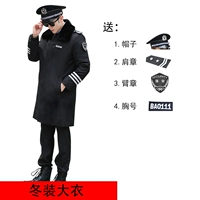 Черное пальто безволосого воротника с аксессуарами с большой кратой шляпой