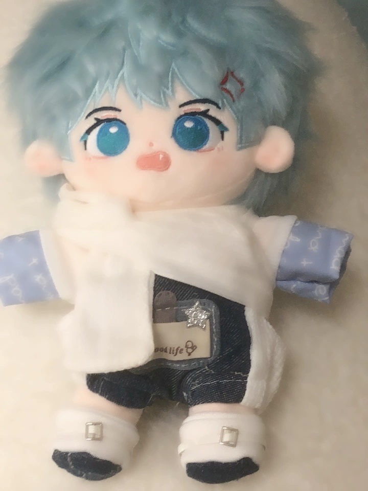 I Can Do It cotton doll wearing a blue and white layered outfit
