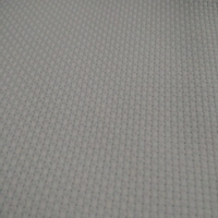 Белая сшивающая ткань из белой кросс