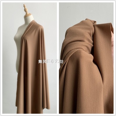 taobao agent Camel brown brown Tencel brother fabric spring and summer knitted four-sided stretch pants skirt clothing fabric drape