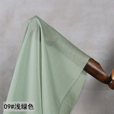 taobao agent Light green silk cotton lining fabric is thin and slightly transliterated without bombs.