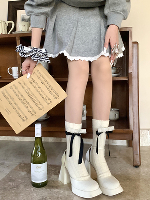 taobao agent CNORAHK niche brand black mid -socks women's tide ins tide ins, sweet pearl bow, sock socks jk calf socks