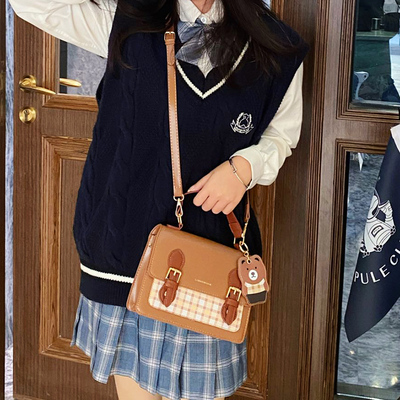 taobao agent Japanese genuine colored student pleated skirt, retro handheld shoulder bag
