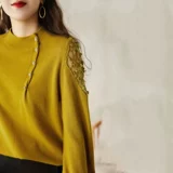 Брендовый трикотажный свитер