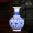 Небольшая голубовато - цветочная фарфоровая бутылка с лотосом без основания