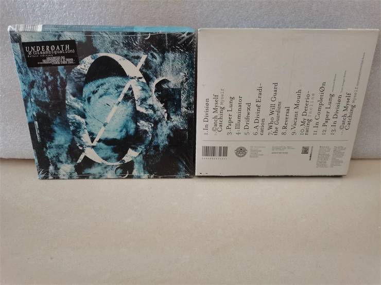 UNDEROATH -er Разграничение металла новое клятва -устранять неоднозначность