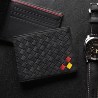 Подкладка из плетеной черной кожи черного, красного и желтого цветов.