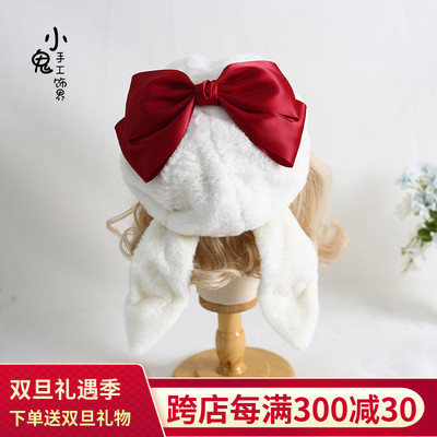 taobao agent Genuine Japanese demi-season warm hat with bow, keep warm rabbit