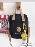 Черное грустное печенье + маленький желтый кулон цветов