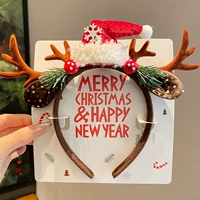 Грибная сосна и кипрессовая рождественская шляпа-коричневые оленя рога