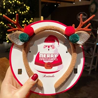 Кофейные плюшевые рога красного и зеленого мяча