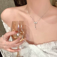 Ожерелье с бантиком с кисточками