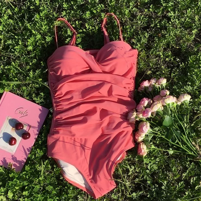 Fuchsia supporting straps, swimwear, (Physicals), worn on the shoulder