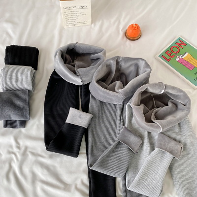 taobao agent Large size autumn and winter new plus velvet thickened vertical stripes leggings fat mm pure color small feet nine -legged tight trousers