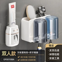 Зубная щетка установлена ​​в верхних двух чашках+сжимание зубной пасты