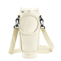 Бежевая круглая сумка