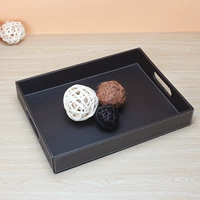 Выкройка из коричневой кожи маленького размера с дырочками