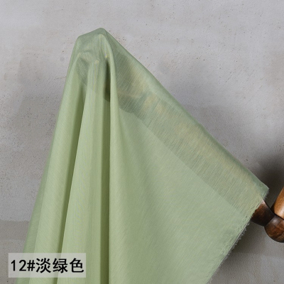 taobao agent Bud green Tencel silk cotton lining fabric Light and slightly transparent non-elastic breathable lining shirt Hanfu sunscreen fabric