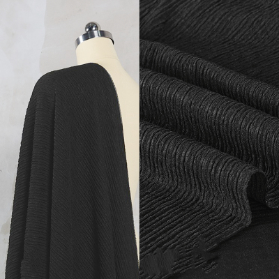 taobao agent Pure black Chiba tripe cloth pleated cloth texture fabric, elastic and thin, spring and summer shirt and pants fabric