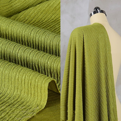 taobao agent Yellow-green avocado green Chichiba tripe cloth pleated cloth texture fabric elastic vertical spring and summer fabric