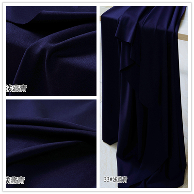 taobao agent Dark blue Tibetan blue super fine brother straight tribute to the woolen woven fabric polyester four -sided elastic pants skirt fabric