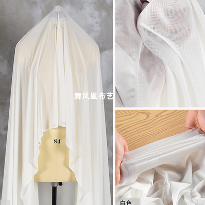 taobao agent Ben white high elastic knitted mesh eye fabric brocade softening bottom with bottoming perspective mesh dress design fabric