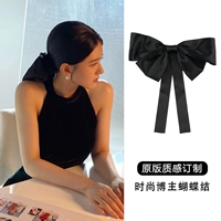 Черная заколка с бантиком