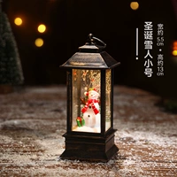 Кристаллические огни поместили [модель снеговика]