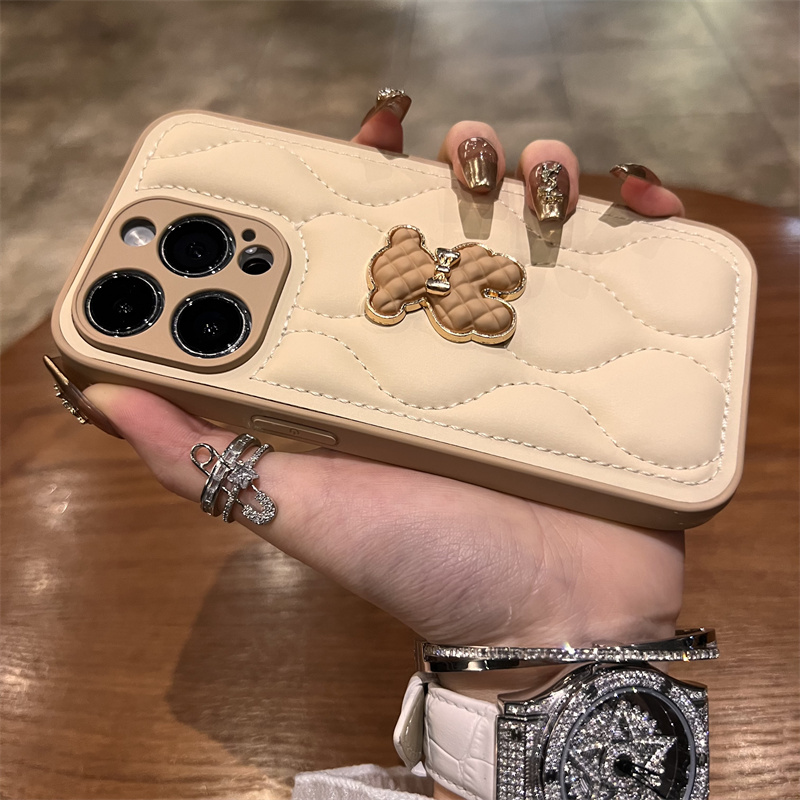 Mælkekaffefarvet læderdunjakke, brun gitterbamse, 15 telefoncover, 14 nye iPhone 15, Promax high-end_voghion.com