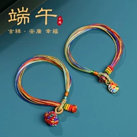 Плетеный детский браслет из красной нити ручной работы