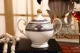 Cà phê Cup Saucer Bone China hộ gia đình hiện đại châu Âu nhỏ trà hoa sang trọng với thìa gốm Bắc Âu ánh sáng sang trọng đỏ tách trà đặt - Cà phê