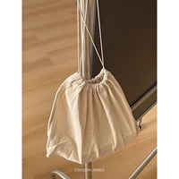 Бежевая маленькая сумка для хранения