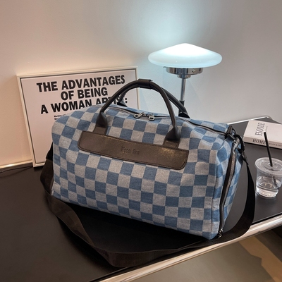 taobao agent Net red chessboard grid travel bag large -capacity waterproof folding travel bag men's luggage storage fitness bag