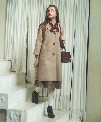 taobao agent Winter commuting literary single -breasted suits pocket pocket pockets loose buttons, thousands of bird grids, medium long coat women