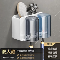 Зубная щетка установлена ​​два чашки